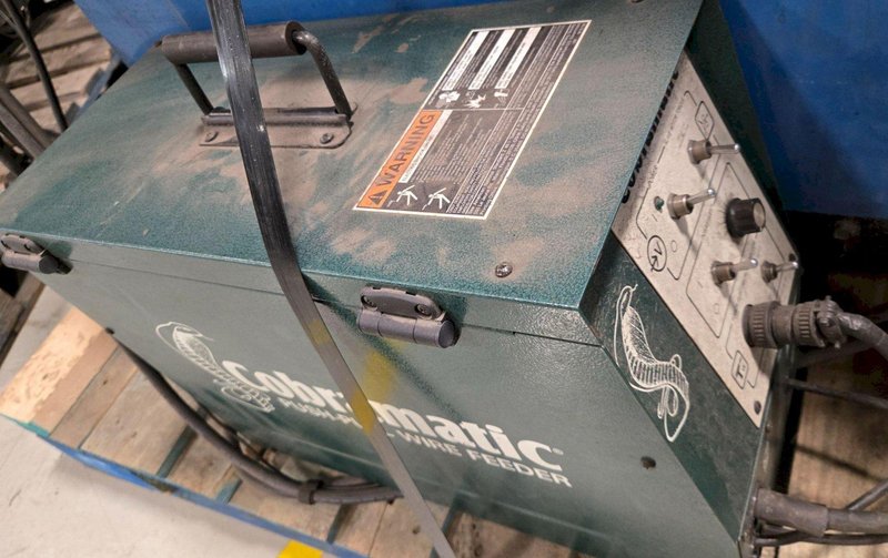 MILLER DELTAWELD 452 WITH WATERMATE 1A COOLING SYSTEM AND  WIRE FEEDER USED