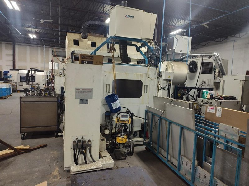 Huron NX40 Double Column Bridge Gantry Machining Center, 2013 – J30 High Pressure Through Spindle Coolant System, Chip Conveyor, Tooling, Siemens Sinumerik Control