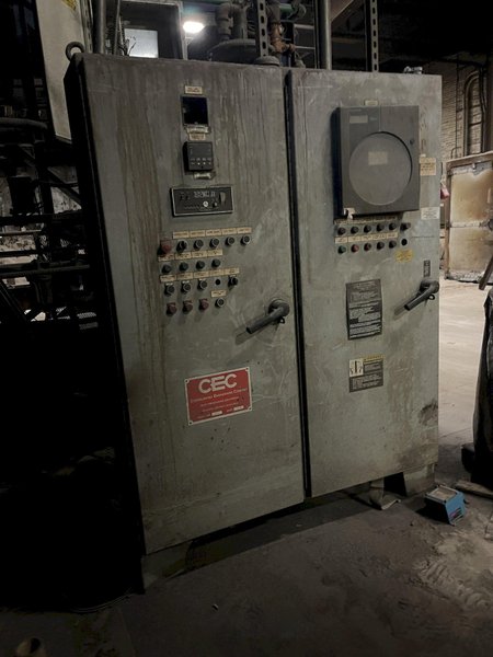 2- 1997 CEC drop bottom heat treat furnaces s/n 2636 and 2650 with common traveling quench tank, 2- drop bottom furnaces, controls, work area is 68" x 120" x 84" high, 100" quench tank, 5,000# capacity, 10 second quench, gas fired