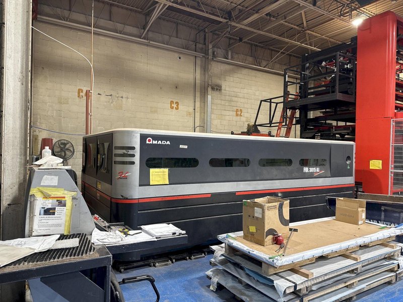 2013 Amada FOL 3015 AJ Fiber Laser Cutting System | 4kW AJ-4000 Engine | ASLUL 300 FOL-AJ Automation Load/Unload Material Storage Tower
