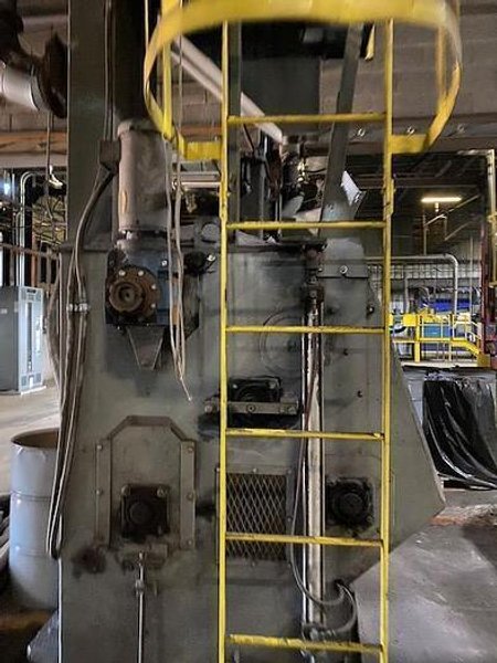 2012 DeLong 7 super rubber belt tumblast machine rated at 7 cu ft capacity, 20hp direct drive shot wheel, very good condition