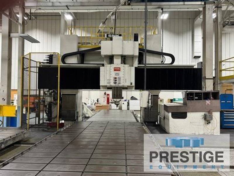 SNK DC-6ASM CNC 5-Face Bridge Mill W/2-Tables