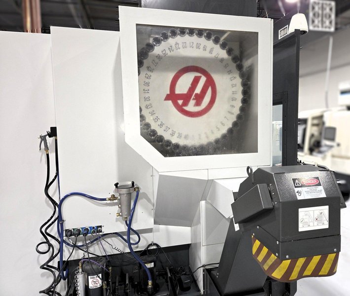 Haas UMC-750SS 5-Axis 2018 with: 5th Axis, 12k RPM Spindle, Through Spindle Coolant, 40 ATC,  Probing, Chip Conveyor, and Coolant Tank.