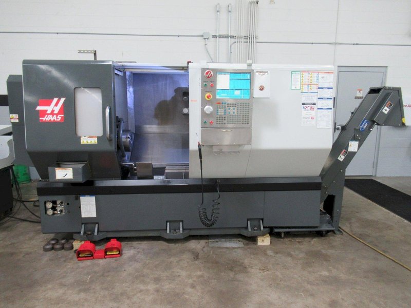Haas ST-30 CNC Turning Center, Live Milling, 12 Station Turret, 3400 RPM Spindle, Tailstock, Chip Conveyor, Tool Presetter, Bar Feed
