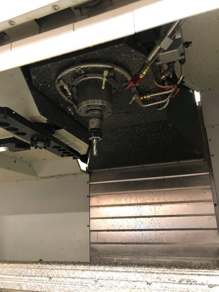 Haas VF-10/40 VMC 2017 with: Haas CNC Control, 4th Axis Drive and Wiring, Haas HRT210-2, 30+1 High Speed Mount Tool Changer, Programmable Coolant and Nozzle, Minimum Quantity Lubrication, Remote Jog Handle, Coolant Tank, and Chip Auger.