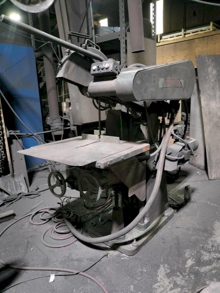 Tabor cut off saw with 25hp motor and power hydrailic assist