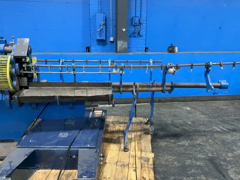WIRE STRAIGHTENING AND CUTTING MACHINE