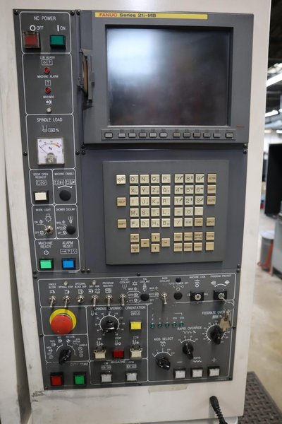 Daewoo Doosan 320/40 CNC Vertical Machining Center with 2 Station Pallet Changer, 12,000 RPM Spindle, 14 Station Rotary Turret, Chip Conveyor- Auction Item