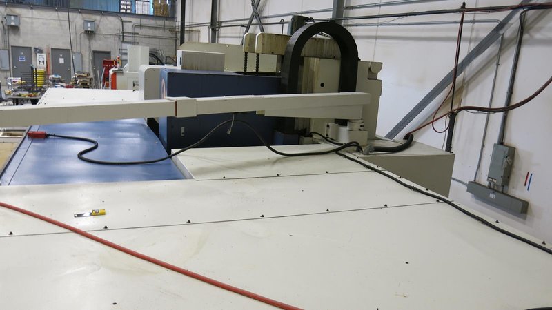 TAKUMI, V32, CNC VERTICAL MACHINING CENTRE, 10,000 RPM SPINDLE, TRAVELS (X,Y,Z): 3200 MM X 1066MM X 750 MM (126&quot; X 42&quot; X 30), DISTANCE FROM NOSE TO SPINDLE:  200MM TO 950MM, DISTANCE FROM SPINDLE NOSE TO THE Z-AXIS GUIDEWAY: 1120MM, T-SLOT TABLE SIZE: 3200MM X 1025MM (126&quot; X 40&quot;), MAX TABLE LOAD, 4500 KG (9,920 LBS), 32 TOOL ATC, TABLE SIZE: 42&quot; X 130&quot;, CAT 50, 30 KW, SPINDLE FLOOD AND THROUGH COOLANT, AIR BLAST, COOLANT FILTER SYSTEM, CHIP WASH DOWN SYSTEM, CHILLED BALL SCREW AND SPINDLE, 4-AXIS CAPABLE,  LEFT AND RIGHT CHIP CONVEYOR,  MITSUBISHI, MEDLAS 60S, CNC CONTROL, 2006, 220/3/60 50 AMP, MACHINE WEIGHT:  52.500 LBS. FLOOR SPACE (W, L, H) 295&quot; X 173&quot; X 139.7&quot; (APPROX.), S/N K0133