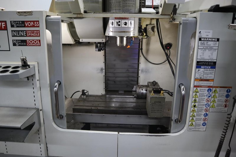 Haas VF-2SS CNC Vertical Machining Center, 12K Spindle, 4th Axis Brushless Drive with SHRT-160H Rotary Table, 24 Station SMTC, Probing, Chip Auger - Auction Item