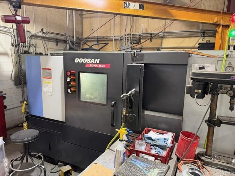 Doosan Puma 2600 CNC Lathe, 2011 – Tailstock, Chip Conveyor, Fanuc 0i Control