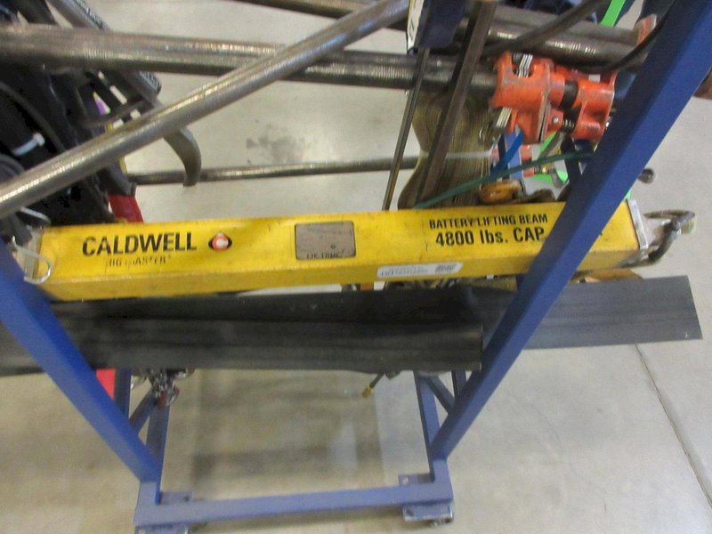 Rolling Cantilever Rack with Large Assortment of Clamps, Come-Along, Posi-Lock 210 Bearing Puller, Caldwell 76E 4800 LBS Batter Lifting Bar- Auction Item