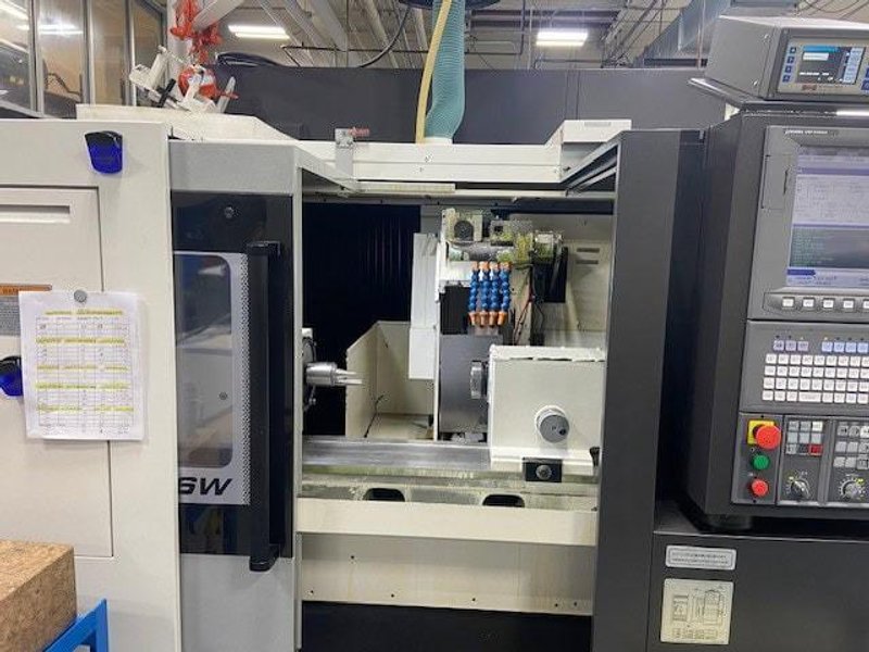 Okuma GP-26W x 65 Compact Cylindrical Grinder, 2019 – Including Plain and Angle Head, Jib Crane, SBS Auto Wheel Balancer