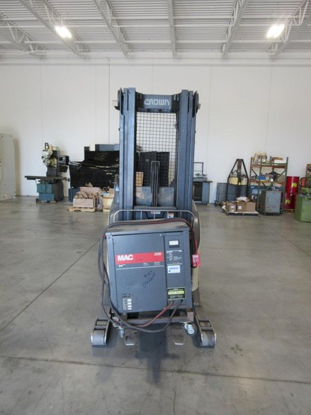 Crown Electric Standing Reach Forklift with Charger, 3500 LB Load Capacity- Auction Item