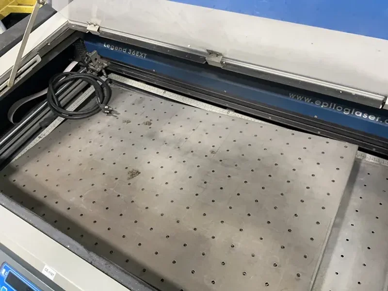 EPILOG CORP. LASER ENGRAVING AND CUTTING MACHINE   -  9000 LASER SYSTEM