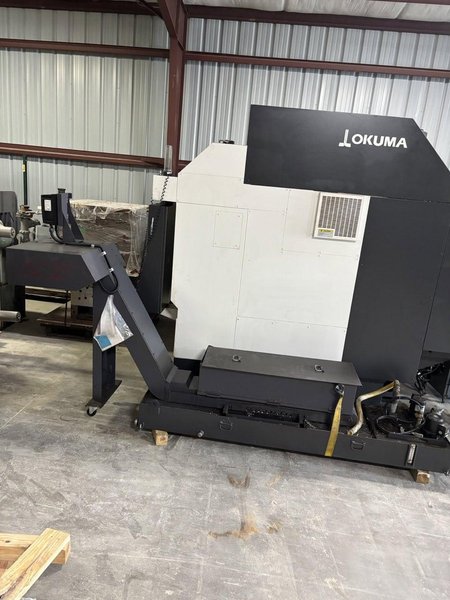 Okuma Genos M560-V VMC, 2021 – 15k Spindle, Chip Conveyor