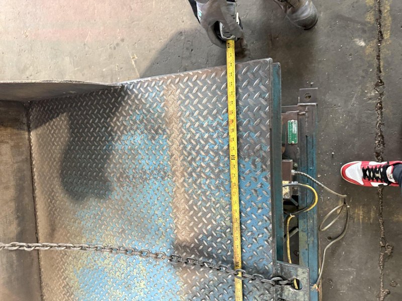 4,000 LB 48&quot; X 48&quot; HYDRAULIC TILT TABLE. STOCK # 1003825.