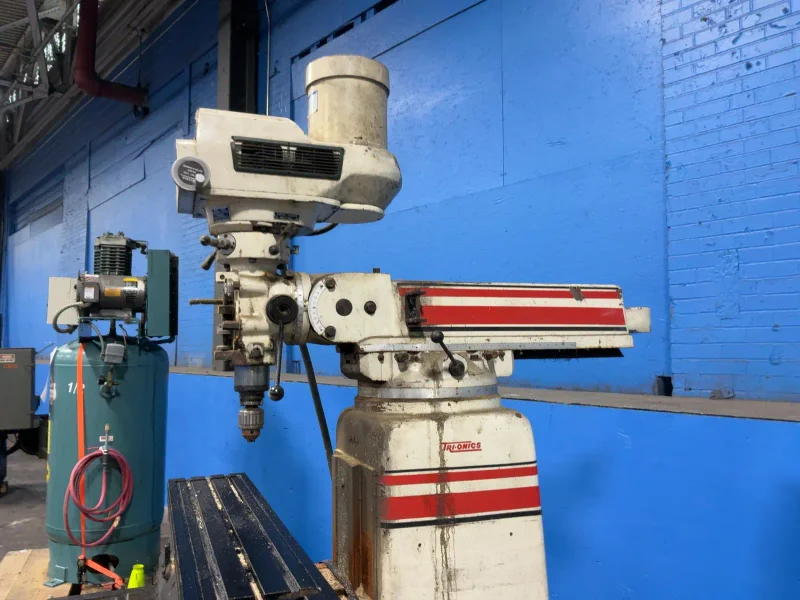 TRI-ONICS INCORPORATED 50” X 10” VERTICAL MILL