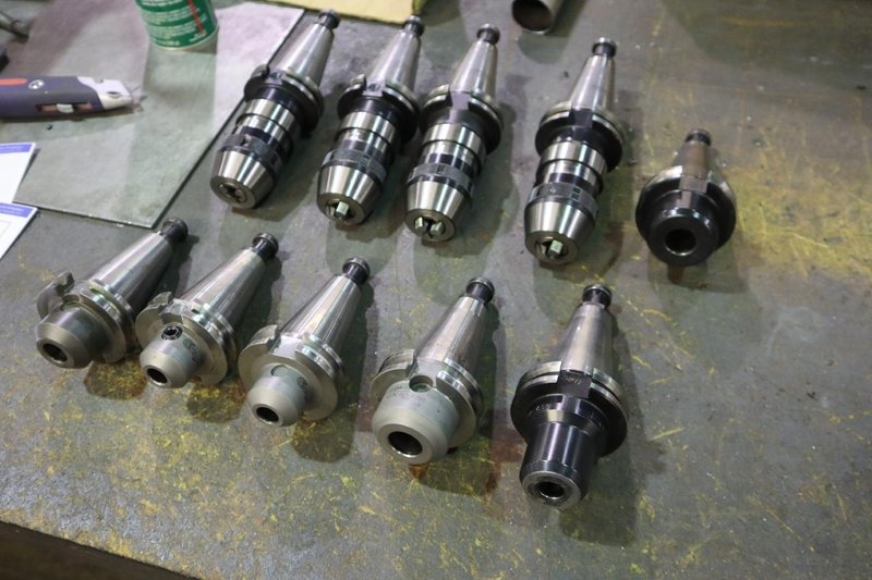CT40 Taper Tool Holders: (4) Nikken NPU-13 Keyless Drill Chucks, (6) End Mill Holders- Auction Item