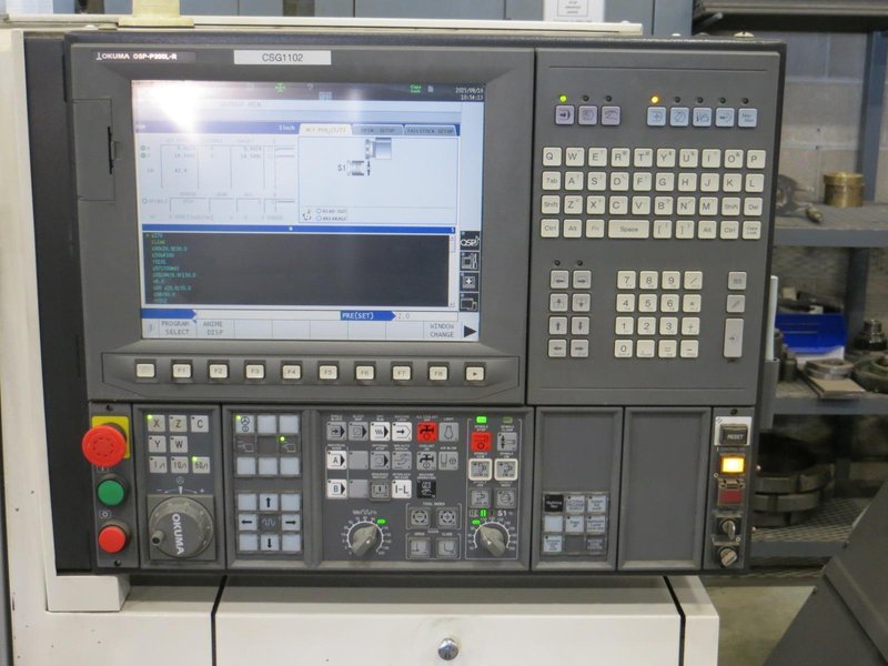 Okuma Genos L250E CNC Turning Center, OSP-P300L/R CNC Control, 8&quot; Chuck, Tool Setter, Parts Catcher, 12-Station Turret, Tailstock, Chip Conveyor