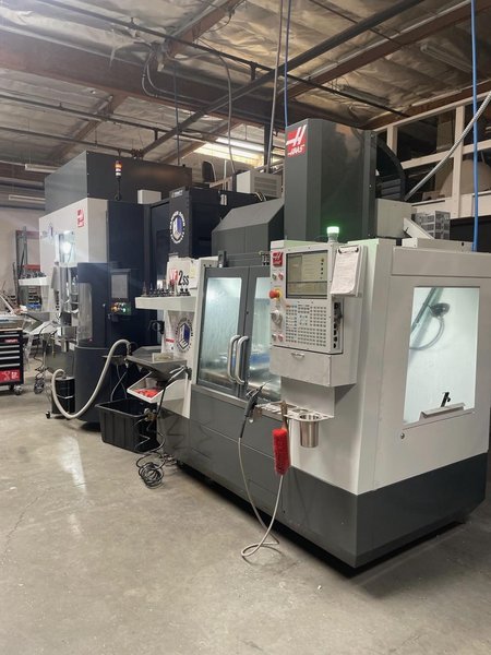 Haas VF-2SS VMC, 2023 – TSC, WIPS, Multi Auger, Auto Window, High Pressure Coolant, HSM, Programmable Coolant