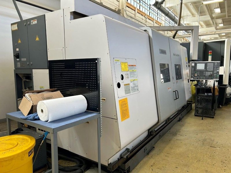 Okuma Macturn 350-W Multi-Axis CNC Lathe, 2004 – Chip Conveyor