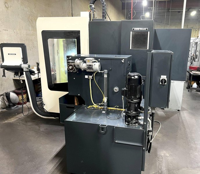 DMG DMU50 5-Axis 2015 Machining Center, Swivel Rotary, CAT40, 18,000 RPM, 60 ATC, Infrared Measuring Probe, Blum tool laser Measuring, Through Spindle Coolant, and Chip Conveyor.
