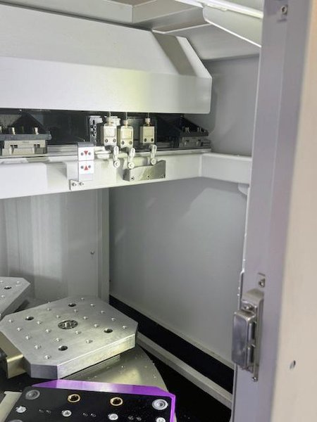 Doosan DVF 5000 5-Axis VMC, 2022 – 18K Spindle, 120 ATC, Through Spindle Coolant/Air, 8 Pallet Changer, Probing, Mist Collector, Conveyor