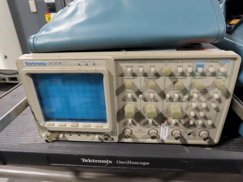 Tektronix 2430A and Tektronix 366 Oscilloscopes with Assorted Manuals and Accessories- Auction Item