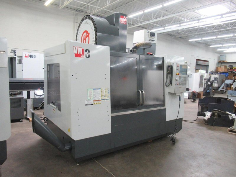 Haas VM-3 CNC Vertical Machining Center with 12,000 RPM CT-40 Spindle, 40 Station Side Mount Tool Changer, Probing, 1000 PSI TSC, High Speed Machining, Mist Collector,  Chip Auger.