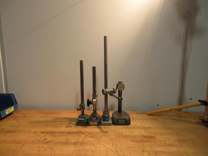 Various Height Gage Stands 10"-25" (4); 1 Mitutoyo, 1 Tumico w/ Indicator, 2-No Name- Auction Item