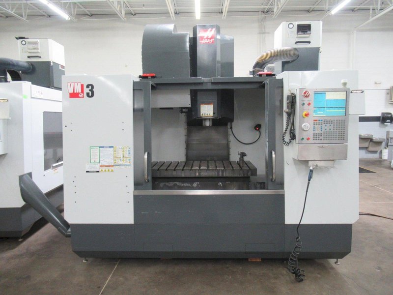 Haas VM-3 CNC Vertical Machining Center with 12,000 RPM CT-40 Spindle, 40 Station Side Mount Tool Changer, Probing, 1000 PSI TSC, High Speed Machining, Mist Collector,  Chip Auger.