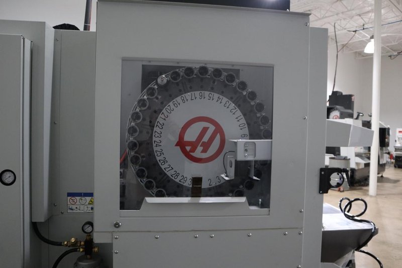 Haas UMC-400SS CNC 5-Axis Vertical Machining Center, Ct40, 12K RPM, 30 ATC, Probing, 230mm Diameter Work Platter, High Speed Machining, Programmable Coolant Nozzle, Chip Auger