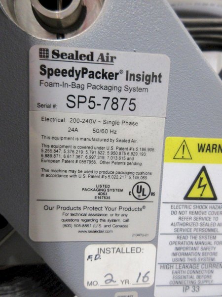 Sealed Air SpeedyPacker Insight, Foam-In-Bag Packaging System, 19" Floor Model, with Drums of Chemicals and Accessories- Auction Item