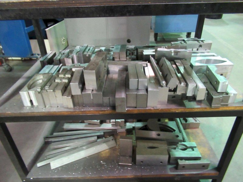 Work Table with 40 Taper Tool Vise and Contents including Large Assortment of Aluminum Vise Jaws- Auction Item