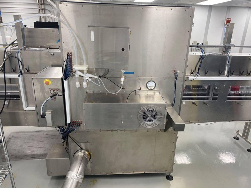 Inline Filling Systems Net-Weight Rotary Jar Filler with Integrated Capping for Clean Room Application in Semi-Conductor Industry, 2009