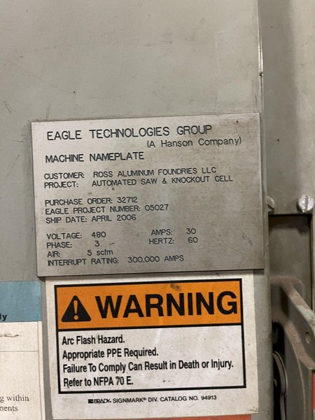 2005 Eagle automated saw and knockout system s/n 05027 with enclosure with light curtain, 2005 Fanuc robot model M-900iA 350 s/n r05743652 with Fanuc system R-J3iB controls s/n e05608535, with saw grips, Eagle enclosure with core knockout system, Allen Bradley plc with panelview 700, core butt discharge conveyor with drive, gate and riser dropoff, related conveyors