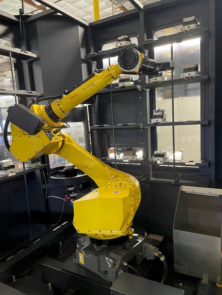 Haas UMC-750 5-Axis Trinity AX-55 Pallet APS 2019 with: Fanuc Robot, High Speed Machining, 40-ATC, 1000 PSI Through Spindle Coolant, Programmable Coolant, and Chip Conveyor.