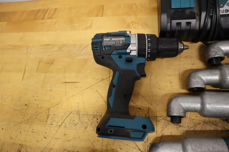 Makita 18V LXT 7-Tool Lot | XPH12 Brushless Hammer Drill, (5) XLT01 Angle Impacts &amp; LED Flashlight w/ Batteries &amp; Chargers- Auction Item