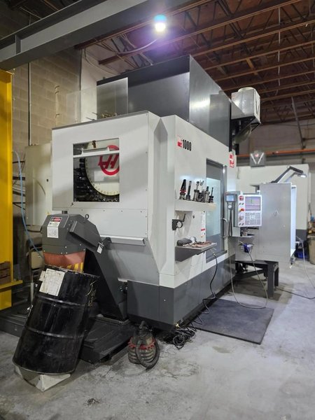 Haas UMC-1000 5-Axis CNC UMC, 2021 – 10-Pallet Changer, 15,000 RPM Spindle, WIPS, Through-Spindle Coolant, Chip Conveyor, Rigid Tapping