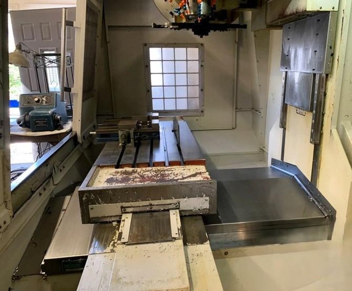 Milltronics VM-22 Vertical Machining Center 2011 with 15000 RPM Spindle
Remote Handjog,  Sidemount ATC, Chip Auger, and Coolant Tank