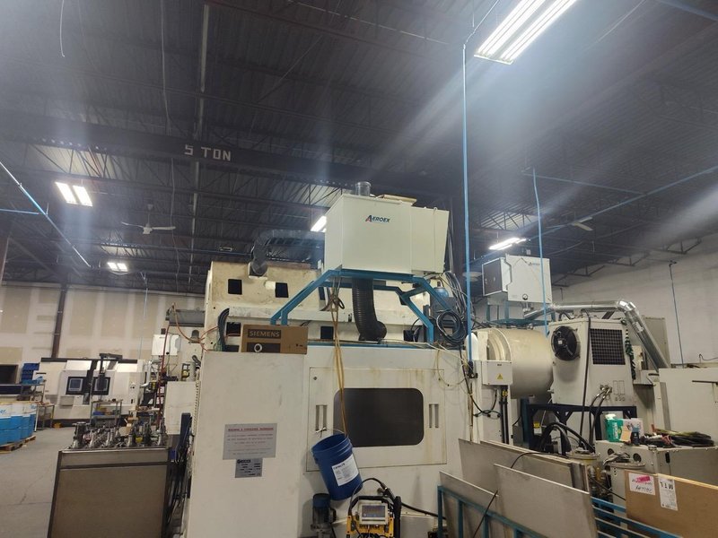 Huron NX40 Double Column Bridge Gantry Machining Center, 2013 – J30 High Pressure Through Spindle Coolant System, Chip Conveyor, Tooling, Siemens Sinumerik Control