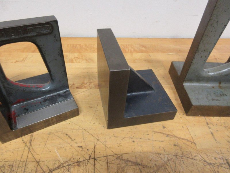 Cast Iron Angle Plates (4 pcs), (1) 4.5" x 5" x 8", (2) 3.75" x 4" x 5", (1) 4" x 4" x 4"- Auction Item