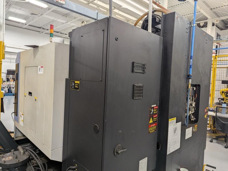 Doosan DNM500 VMC, 2008 – Chip Conveyor