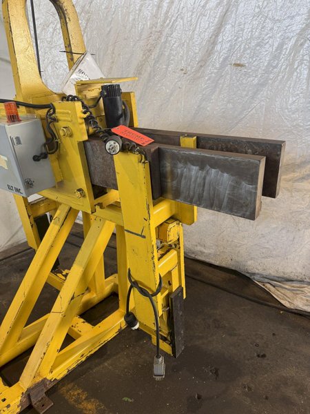 10,000 LBS ADJUSTABLE POWERED COIL GRABBER. STOCK # 0917219