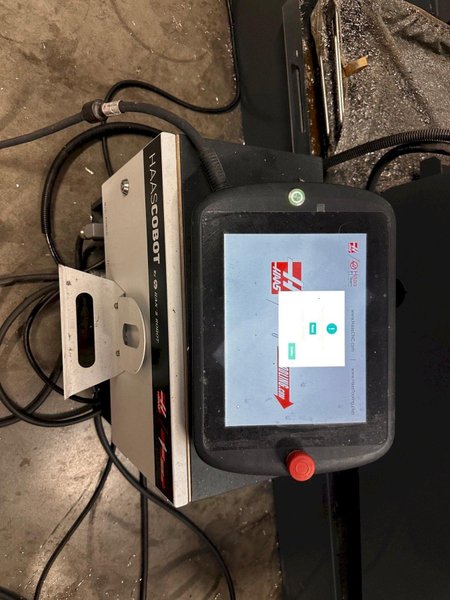 2024 HAAS VF-2SS with HC10 6-Axis Cobot with low hours. Vertical Machining Center