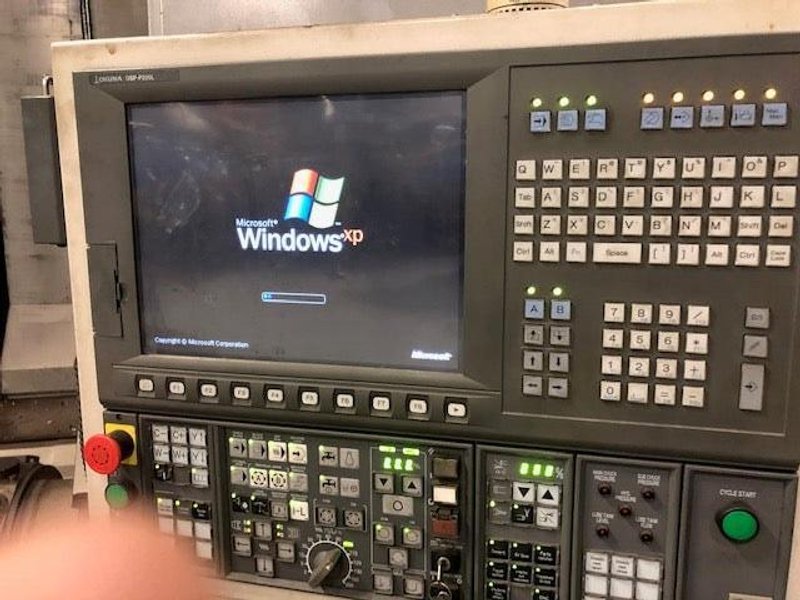 Okuma MacTurn 550W Multi-Axis CNC Lathe, 2008 – Chip Conveyor, Tooling Included