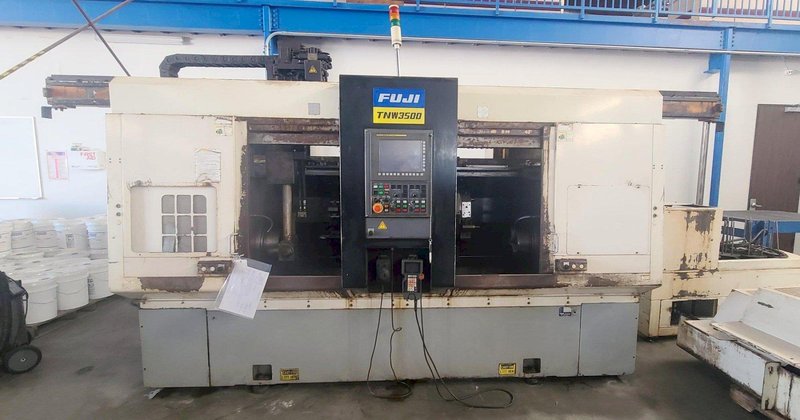 FUJI TNW-35TR 6-AXIS TWIN SPINDLE LIVE TOOL LATHE W/ GANTRY LOADER, 2007- Twin Turrets, 8″ Chucks x2