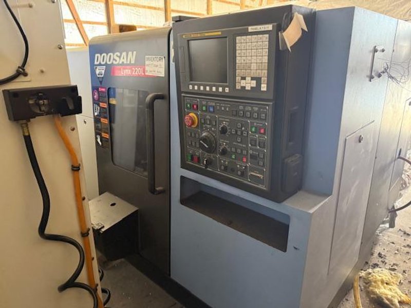 Doosan Lynx 220LC CNC Turning Center Lathe, 2013 – Chip Conveyor