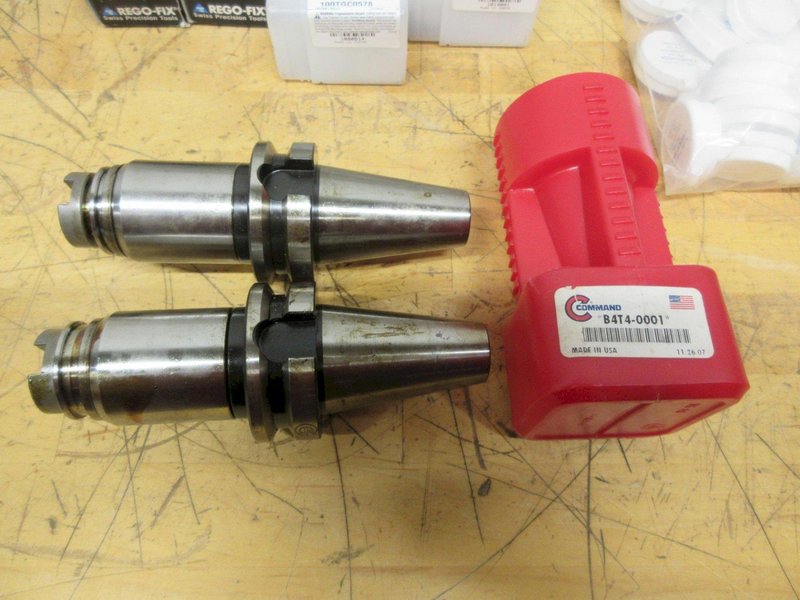 Mill Tool Holders Assorted CAT50, BT40, NMTB40, ER40 Collets, TG100 Collets, and 18x13x6" SST Wire Parts Basket- Auction Item